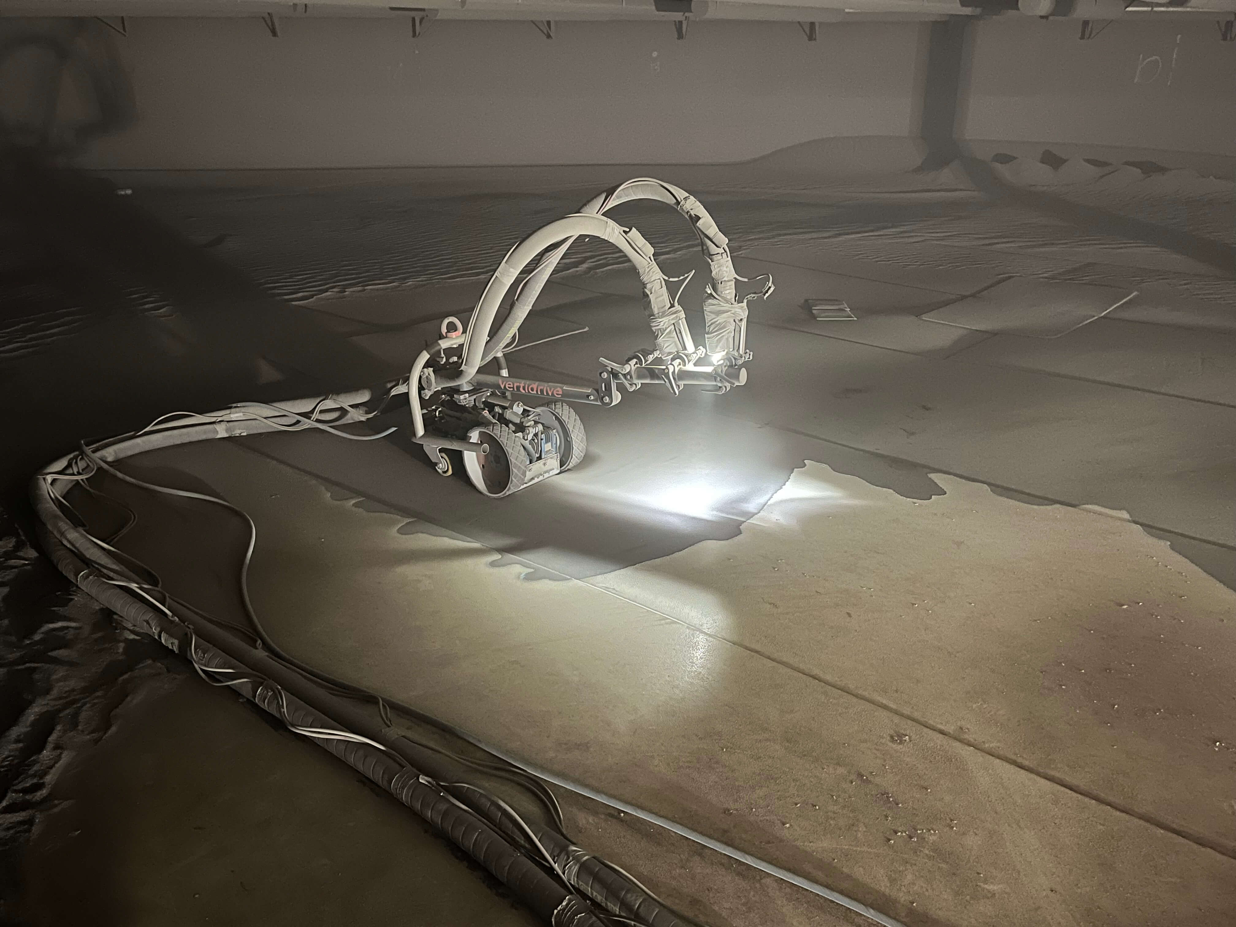 A BlastOne remote abrasive blaster prepares the surface inside SunocoLP’s Tank 32001 in Linden, New Jersey.