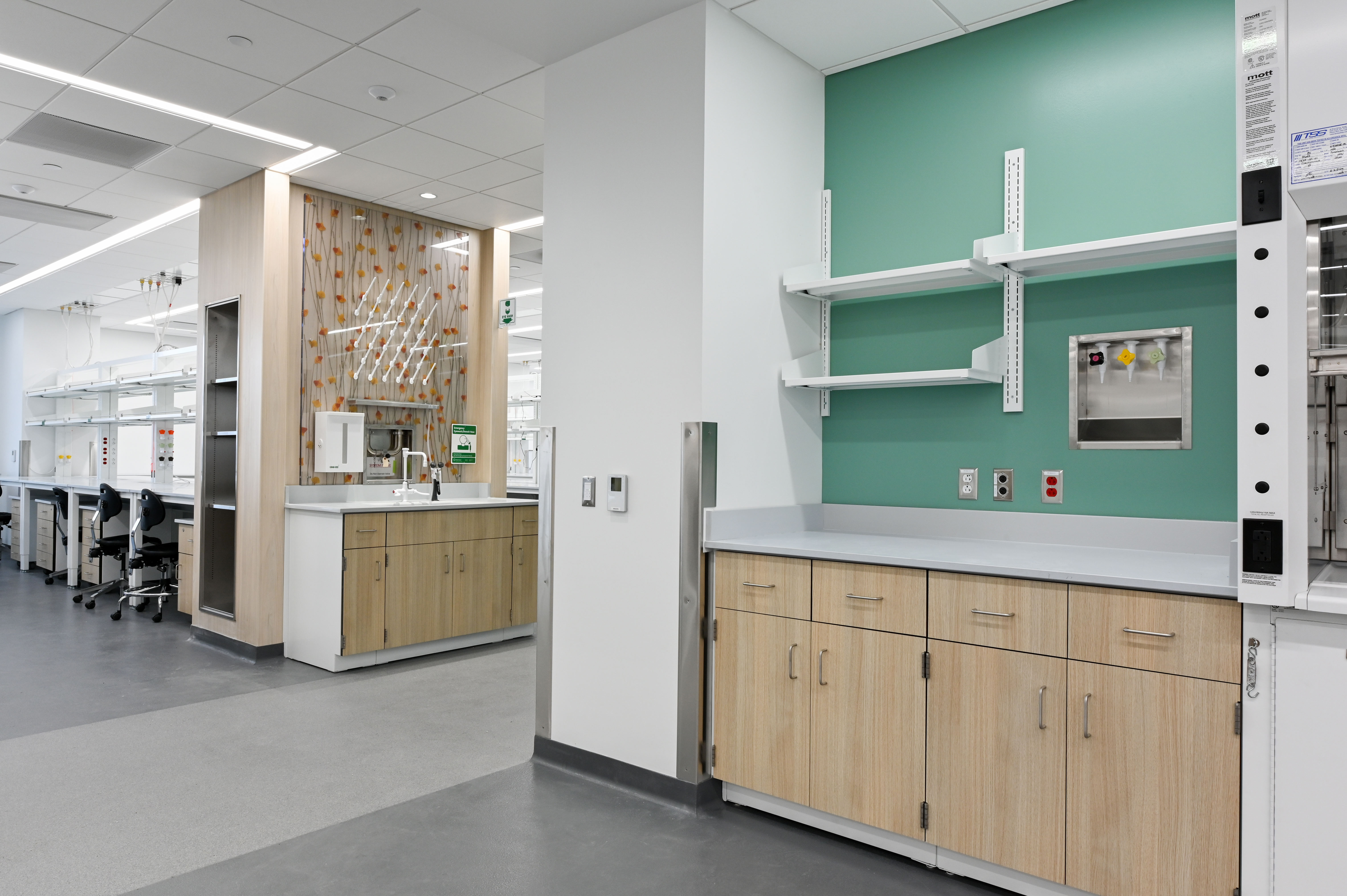 A newly renovated laboratory includes updated process equipment, work spaces, and a new epoxy floor topping.